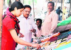 A woman shops for Navratras at a local market in Amritsar on Wednesday