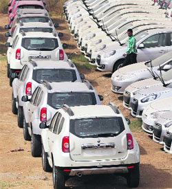 Renault cars parked at the companys stockyard on the outskirts of Ahmedabad.