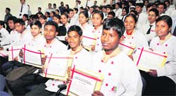 Inmates of Snehalaya after receiving certificates during the prize distribution function at the Dr Ambedkar Institute of Hotel Management Catering & Nutrition in Sector 42, Chandigarh, on Wednesday. Tribune photo: Parvesh Chauhan