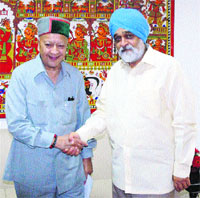 Chief Minister Virbhadra Singh and Montek Singh Ahluwalia, Deputy Chairman, Planning Commission, in New Delhi on Wednesday.