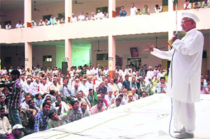 Social activist Anna Hazare addresses a meeting in Rohtak on Wednesday.