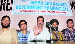 Members of the J&K Government Pharmacists address mediapersons in Jammu on Wednesday. Tribune Photo: Inderjeet Singh