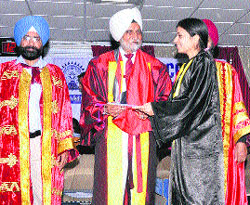 Dr SS Johl awards a degree to a student during the annual convocation of the LCET in Ludhiana on Wednesday.