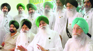 Ajmer Singh Lakhowal addresses a press conference at the BKU office in Ludhiana on Wednesday. 