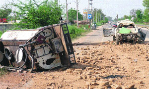 A milk tanker and a tractor-trailer lie on the Ludhiana-Malerkotla road near Sayan village near Ahmedgarh after a collision on Wednesday. 
