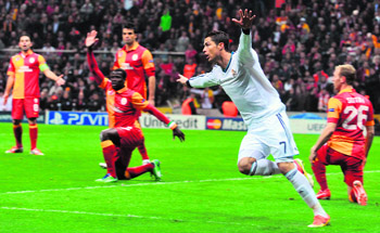 Real Madrids Cristiano Ronaldo celebrates after scoring the first goal for his team during the Champions League quarterfinal second leg win over Galatasaray in Istanbul on Tuesday night.