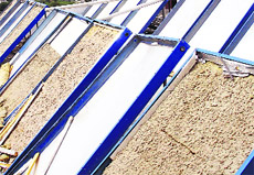 The broken glass panels of the solar system installed on the roof of Bebe Nanki Mother and Child Care Centre from where thieves have stolen copper in Amritsar.