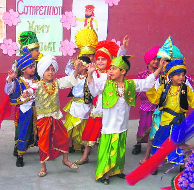 Students of Ryan International School present a performance ahead of Baisakhi in Amritsar on Thursday. 