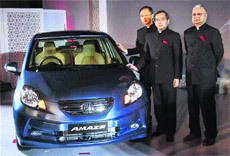 Honda Cars India officials at the launch of Amaze in New Delhi on Thursday.
