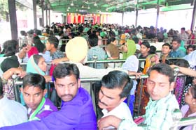 Devotees line up at Mansa Devi Temple in Panchkula on Thursday