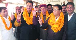 OP Uniyal (in spectacles), along with Mussoorie MLA Ganesh Joshi (fourth from right), at a nomination centre in Mussoorie on Thursday.