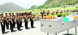 An Army contingent pays the last respects to Nand Kishore Joshi, who was killed in South Sudan, at the airport in Pithoragarh on Thursday. Photo: BD Kasniyal