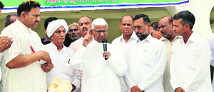 Anna Hazare addresses farmers at Guru Teg Bahadur Memorial, near Rai, on Thursday.