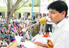 Rohtak MP Deepender Singh Hooda addresses a gathering at Mirchpur village on Thursday. 
