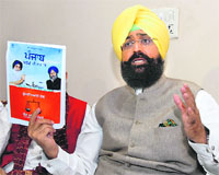 PPCC chief Partap Singh Bajwa talks to mediapersons in Jalandhar on Thursday. 