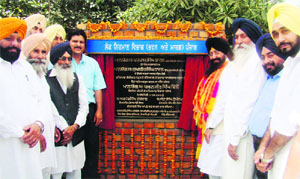 PWD Minister Sharanjit Singh Dhillon lays down the foundation stone of Ludhiana- Chandigarh- Jandiali- Kohara- Sahnewal road on Thursday.