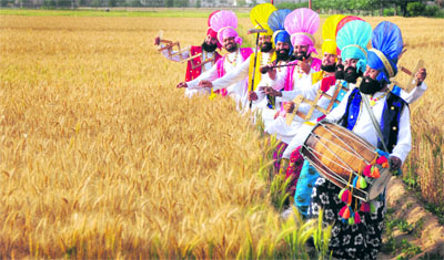 Artistes perform bhangra ahead of Baisakhi in Ludhiana on Thursday.