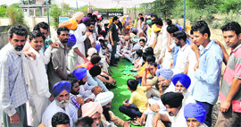 Residents on Kanakwal village protest against Bathinda oil refinery on Thursday.