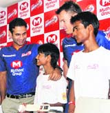 Delhis Irfan Pathan and Johan Botha at a promotional event in Delhi on Thursday.  A Tribune photograph