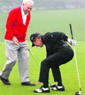 Honorary starter Arnold Palmer with Gary Player after starting the first round of the Masters on Thursday.  AFP