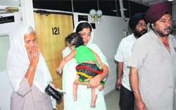 The victims family come out of the office of the MC Commissioner at Sector 17, Chandigarh, 