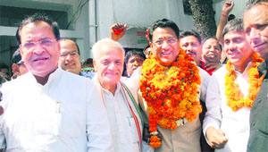 Uttarakhand Congress chief Yashpal Arya and Major Ved Parkash (retd), central party observer, along with Suryakant Dhasmana at the Congress Bhavan in Dehradun on Friday. 