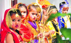 Students of Maple Bear, a playway school, celebrate Baisakhi in Ludhiana on Friday.
