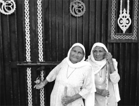 Devinder Pal Singh Bhullar's aunts Mohinder Kaur and Jagir Kaur outside his locked house at Dayalpura Bhai-Ka in Bathinda on Friday. 