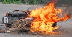 The motor-cycle of the alleged eve-teaser that was set on fire by VHP activists in Bathinda on Saturday. Photo: Bhupinder Dhillon 