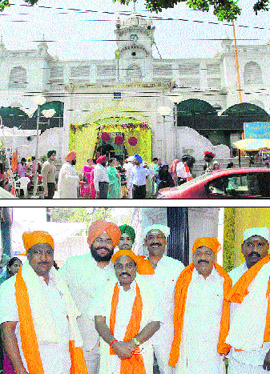 Gurdwara Singh Sabha in Model Town decked up for the wedding of the son of Lt-Governor of Puducherry Iqbal Singh in Jalandhar on Saturday; and (below) Puducherry ministers at the wedding.
