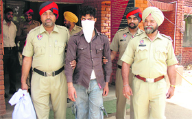 An accused in police custody in Ludhiana.