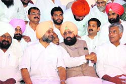 PCC president Partap Singh Bajwa, CLP leader Sunil Jakhar, Jeet Mohinder Singh, MLA, Talwandi Sabo at the partys conference at Talwandi Sabo on Saturday. A Tribune photo: Pawan Sharma