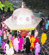 Devotees pray at Suhi Mata temple in Chamba
