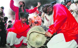 Music and dance during the Mela Chiragan at the mazaar of 16th century Sufi saint Shah Hussain, the master of kaafi. He is called Madho Lal Husain by Lahoris.