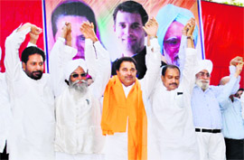 Punjab Pradesh Congress Committee vice-president OP Soni (centre) with other Congress leaders during a meeting with party workers in Amritsar on Sunday. 
