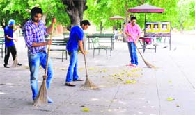 SOPU members clean the Student Centre area at Panjab University in Chandigarh on Sunday