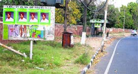 Posters of student leaders pasted on the layout plan of Sector 26