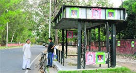 Posters at a CTU bus stop in Sector 26