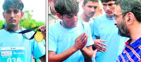 Sunil, who was awarded a medal, argues with an official after his name was dropped from the winners list
