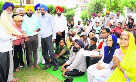 Members of the Physically Handicapped Association present a memorandum to Youth Akali Dal senior vice-president Harsukhinder Singh Bubbi Badal (third from left) during a meeting at Phase XI, Mohali, on Sunday