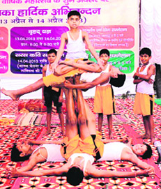 Students of Gurukul Maha Vidyalaya showcase yoga skills during the concluding session of a two-day 106th annual function of the college at Jwalapur in Haridwar on Sunday.