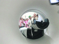 Health Minister Kaul Singh Thakur inaugurates a CT scan machine at Palampur on Sunday. 
