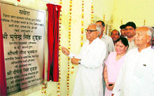 Chief Minister Bhupinder Singh Hooda inaugurates a school for special children in Jhajjar on Sunday.