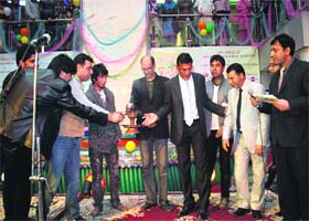 Kashmir Divisional Commissioner Shailendra Kumar along with other officials inaugurates the Sangarmaal Spring Festival in Srinagar on Sunday