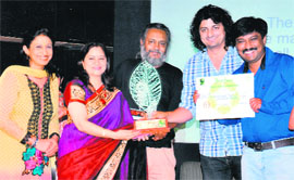 DAV International School principal Anjana Gupta receives the award in New Delhi. 