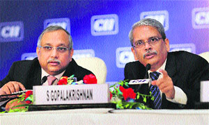 CII president S Gopalakrishnan with Director-General Chandrajit Banerjee addressing a press conference in Delhi on Monday