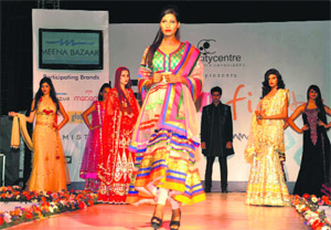 Models sport latest dresses at DLF City Centre’s Fiesta on Monday.