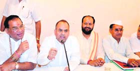 Congress mayoral candidate Swami Rishiwaranand Maharaj, along with party leader Braham Swaroop Brahmchari, at a press conference in Haridwar on Monday