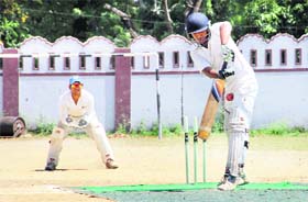 A batsman in action during a match in the 61st Dehradun District Cricket League in Dehradun on Monday