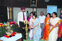 Tomoko Kikuchi, a Hindi scholar from Japan, inaugurates an international seminar on 'Mahadevi Verma Ki Sahitya Sadhna' by lighting the traditional lamp while Lt-Gen (retd) DDS Sandhu (extreme left), Vice-Chancellor, KU, looks on at the KU faculty lounge recently.